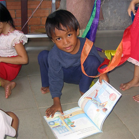 [Photo: Reading Books in Cambodia]